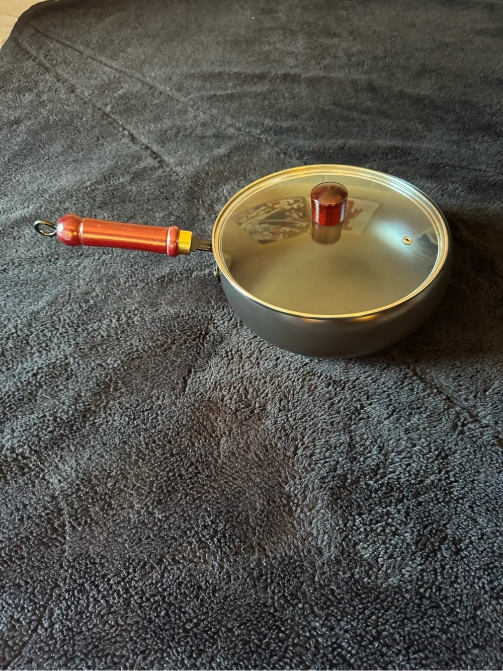 Bulbous Cast Iron Pot. Comes with 2 scrubs. Brand New in Box.